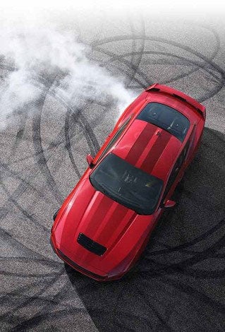 Overhead view of a 2024 Ford Mustang® model with tire tracks on pavement | Fox Ford Inc. in Wolf Point MT